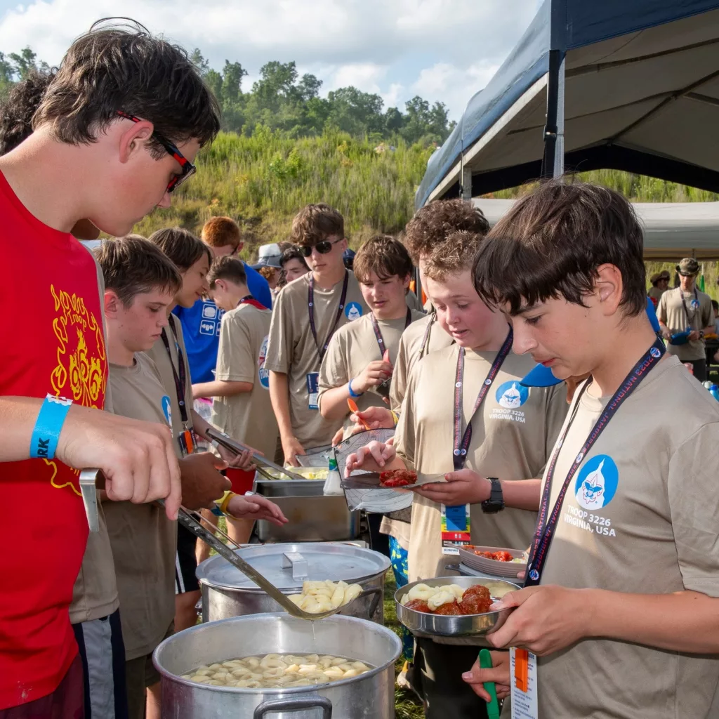 Scouts serve food at the National Jamboree